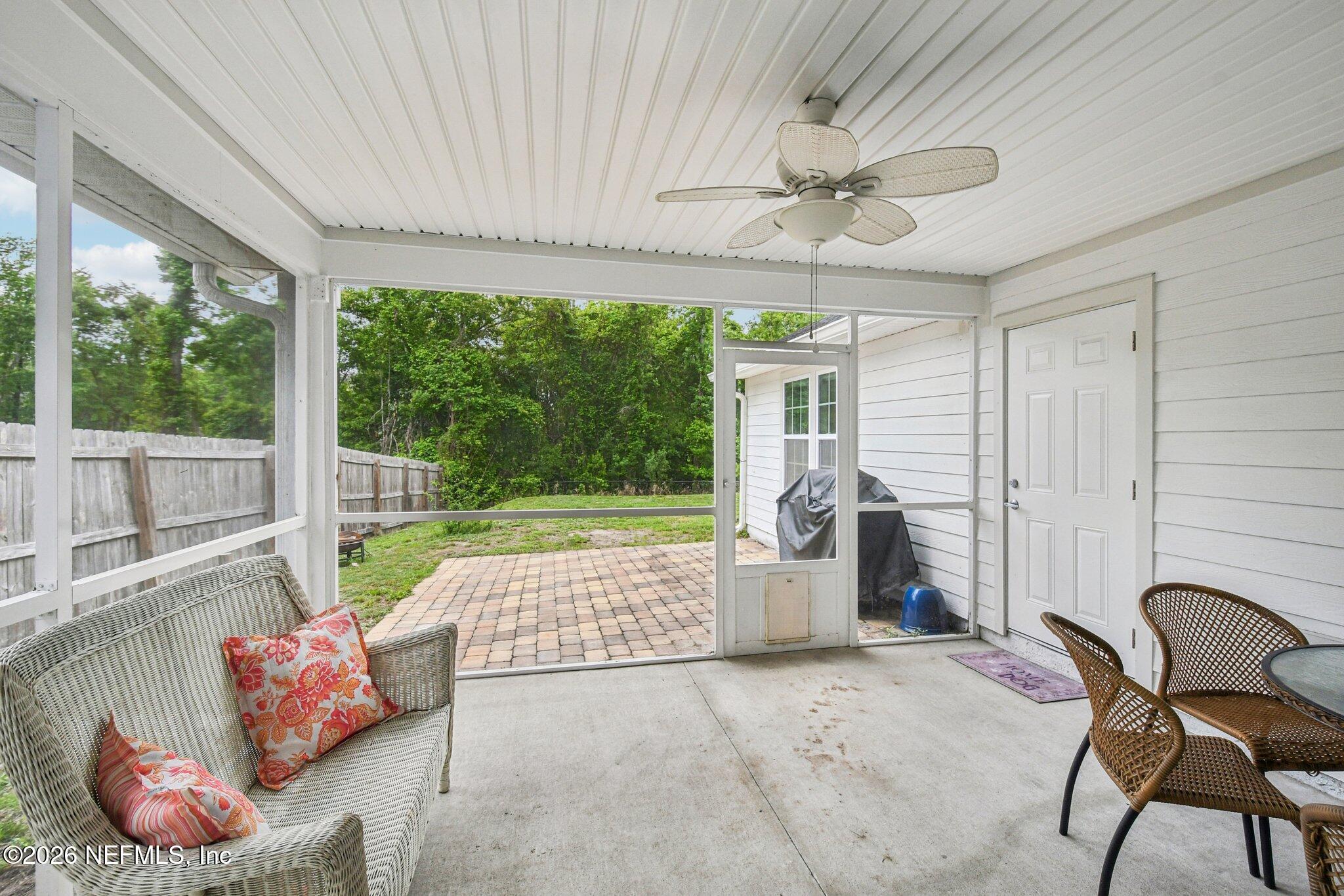 4183 Pine Road Orange Park, FL 32065 - Photo 45 of 62 a living room with furniture and a large window