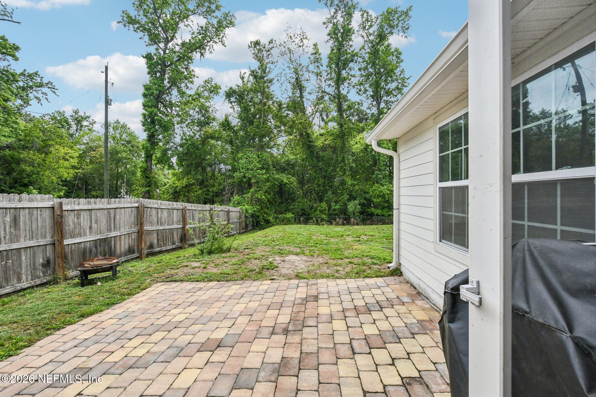 4183 Pine Road Orange Park, FL 32065 - Photo 48 of 62 a front view of a house with garden