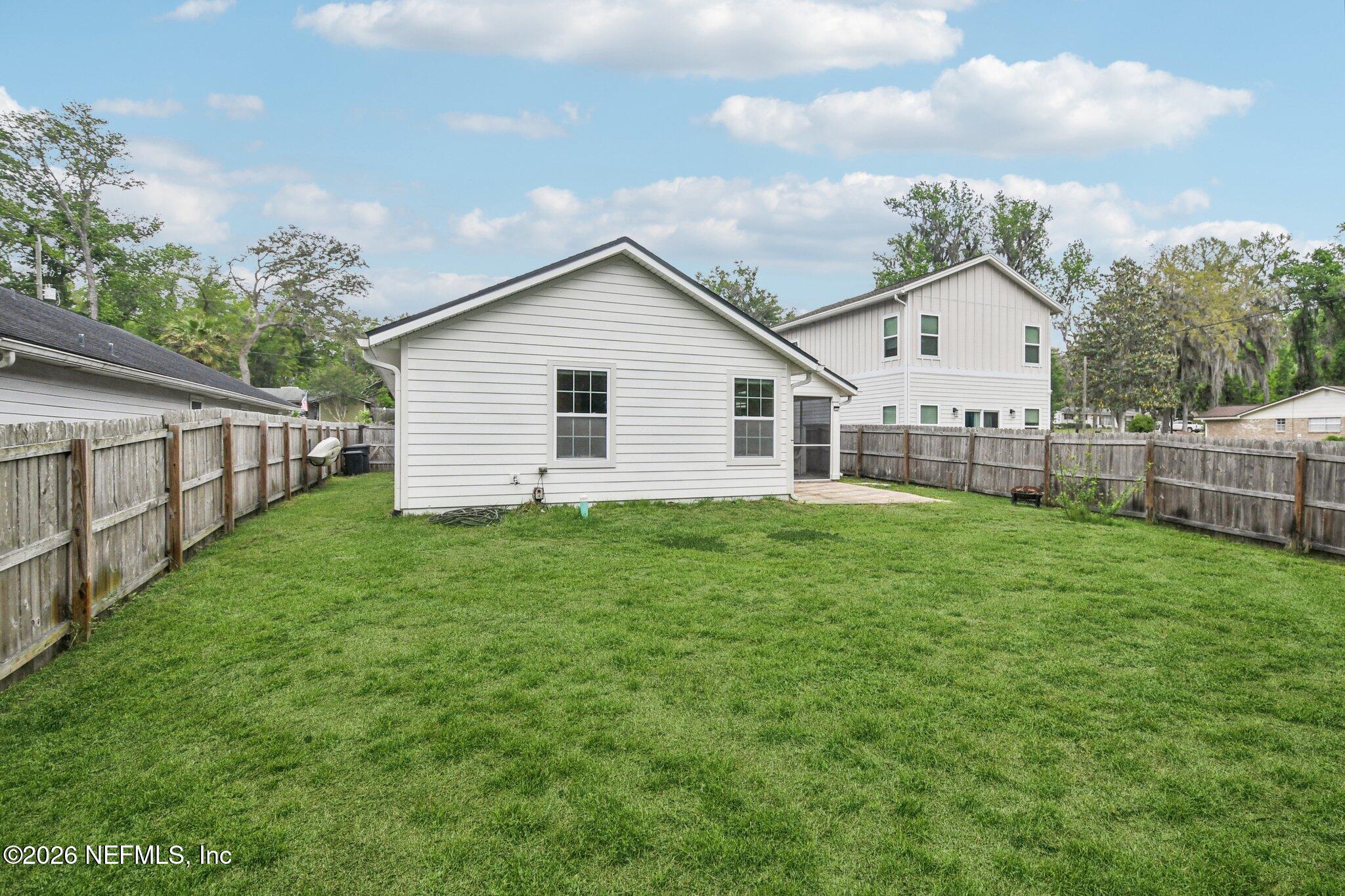 4183 Pine Road Orange Park, FL 32065 - Photo 51 of 62 a view of a backyard with a garden and plants