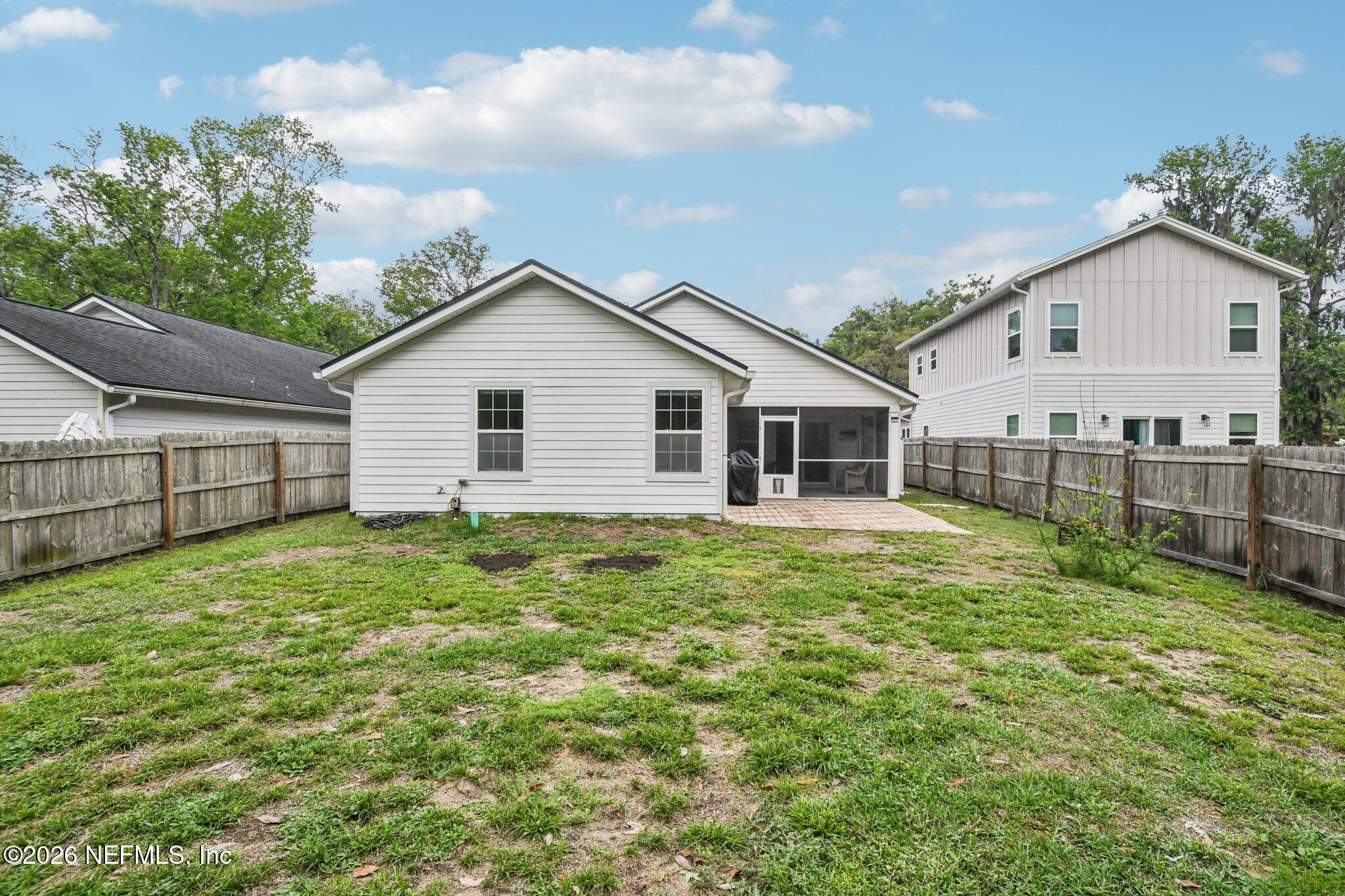 4183 Pine Road Orange Park, FL 32065 - Photo 52 of 62 a view of a backyard with plants and large trees