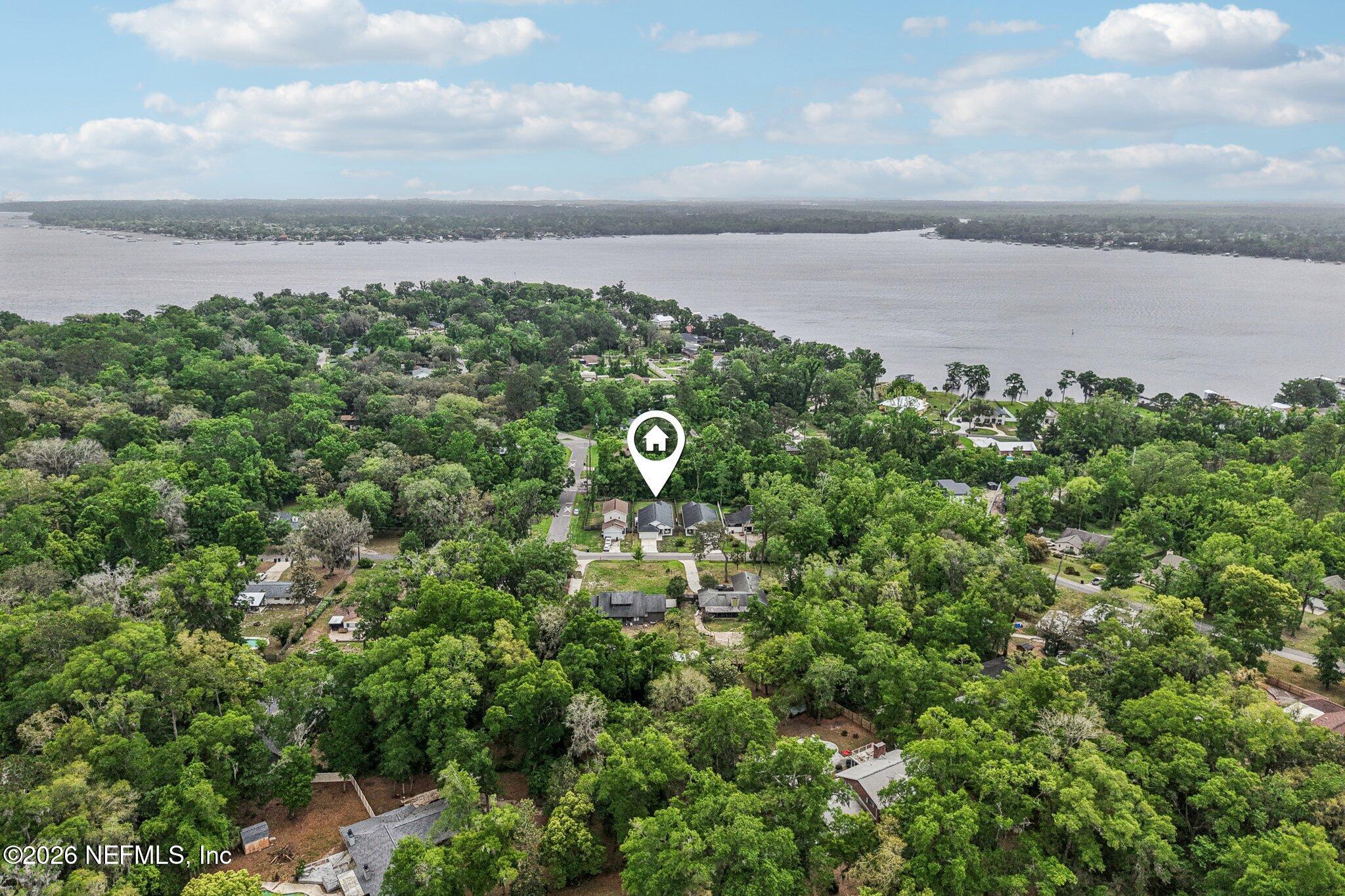 4183 Pine Road Orange Park, FL 32065 - Photo 53 of 62 a view of a lake from a yard