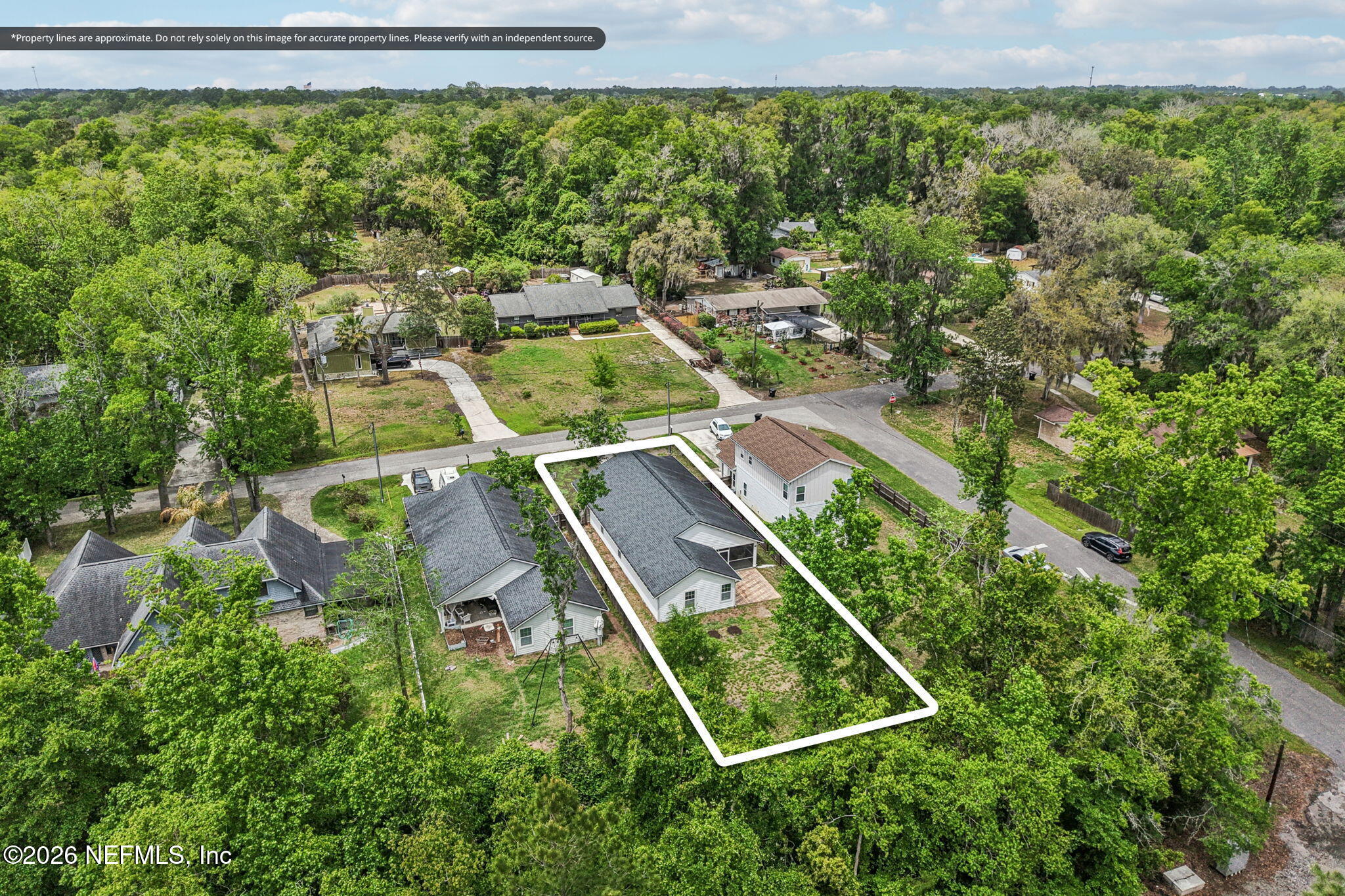 4183 Pine Road Orange Park, FL 32065 - Photo 56 of 62 an aerial view of residential house with outdoor space and trees all around