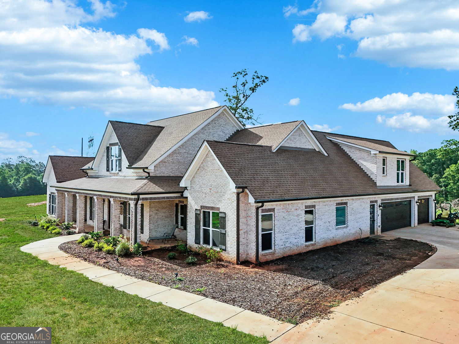 357 Old Driver Road Whitesburg, GA 30185 - Photo 11 of 75 a front view of a house with a yard