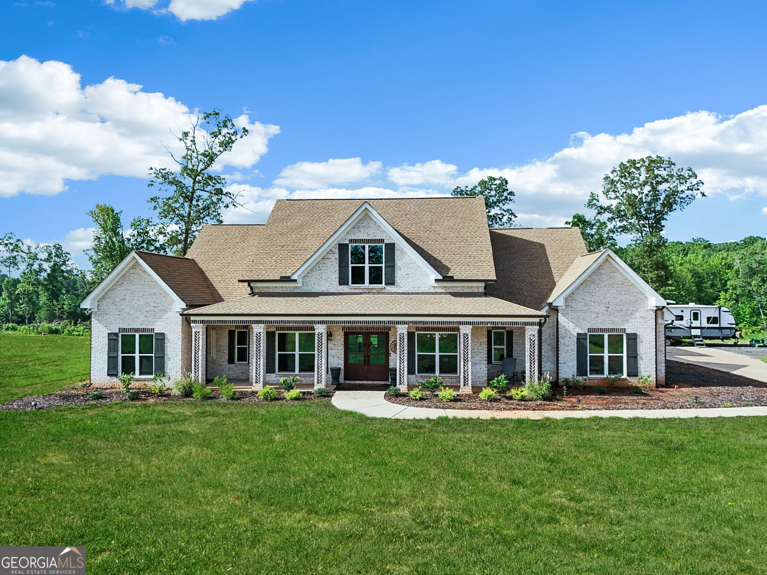 357 Old Driver Road Whitesburg, GA 30185 - Photo 12 of 75 a front view of a house with a yard