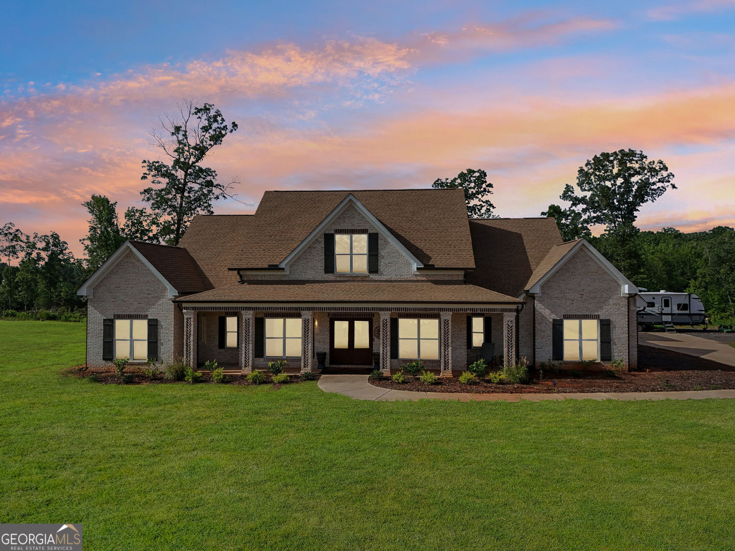 357 Old Driver Road Whitesburg, GA 30185 - Photo 13 of 75 a view of a big house with a big yard and large trees