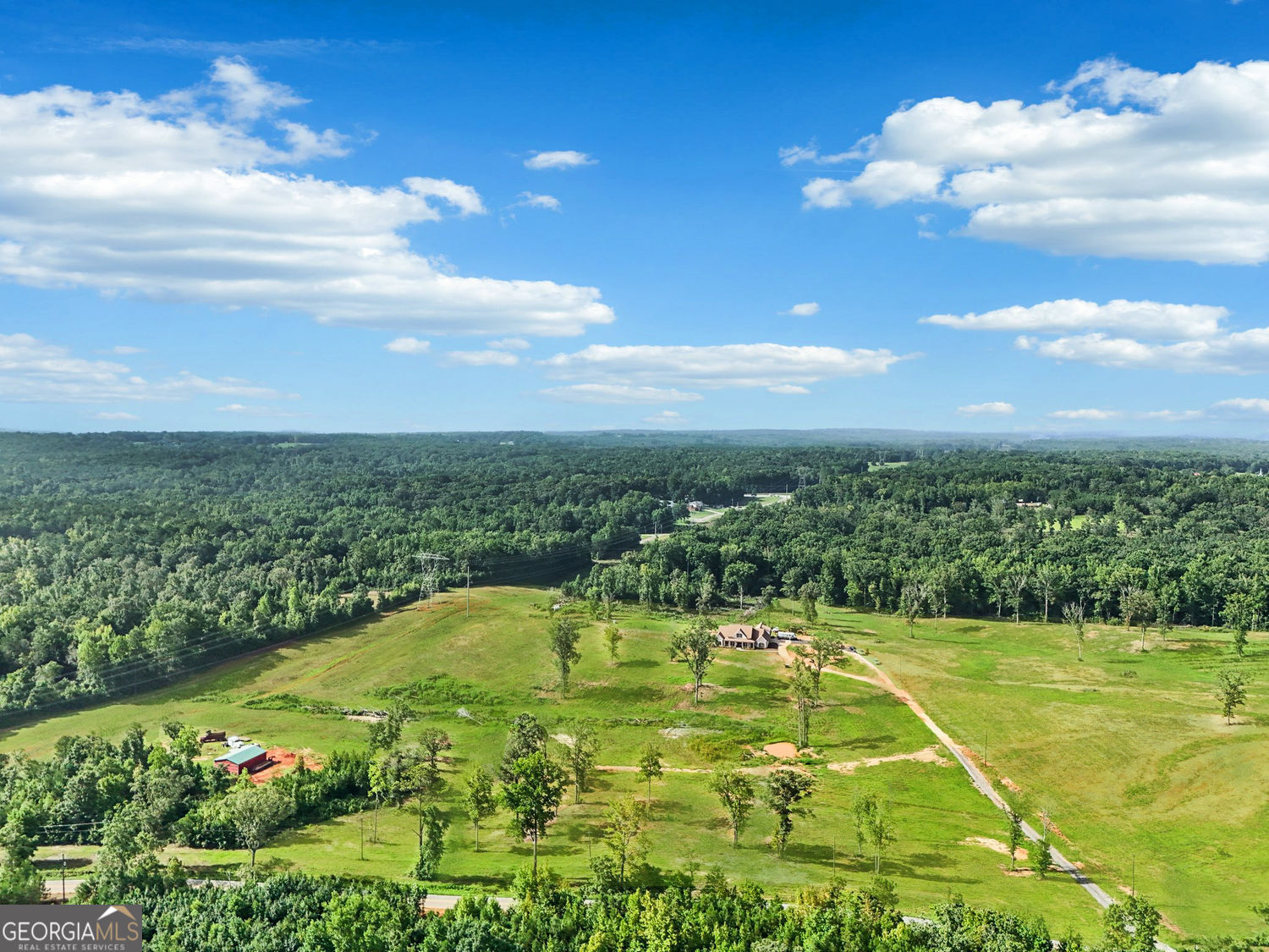 357 Old Driver Road Whitesburg, GA 30185 - Photo 20 of 75 a view of a swimming pool with a garden