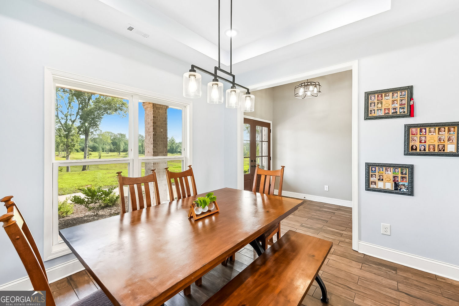 357 Old Driver Road Whitesburg, GA 30185 - Photo 39 of 75 a view of a dining room with furniture window and wooden floor