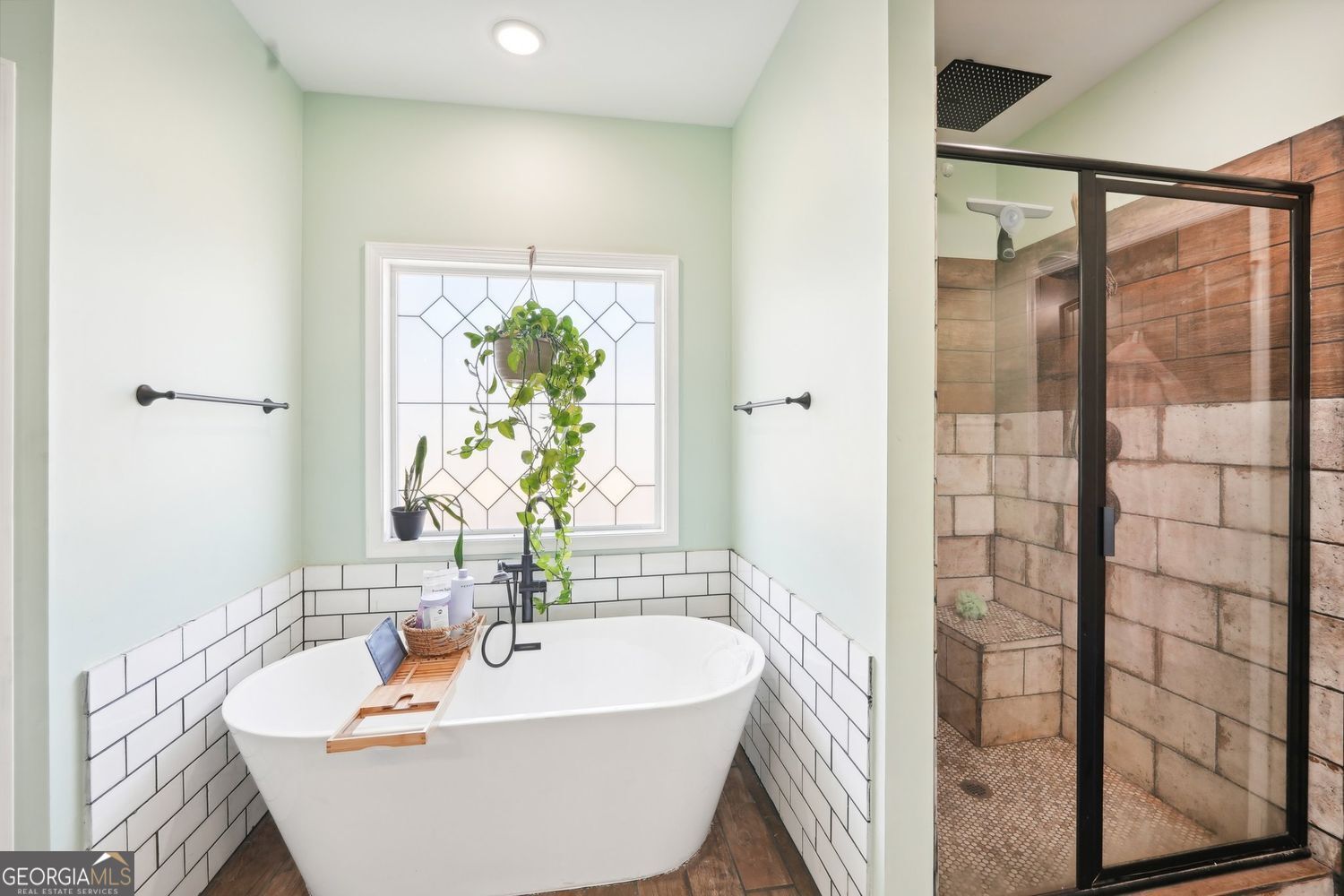 357 Old Driver Road Whitesburg, GA 30185 - Photo 52 of 75 a bath tub sitting next to a white sink