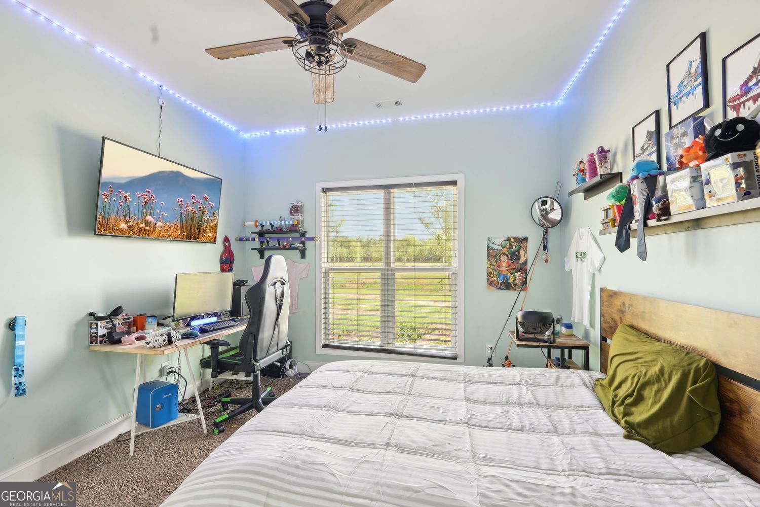 357 Old Driver Road Whitesburg, GA 30185 - Photo 59 of 75 a bedroom with furniture and a flat screen tv