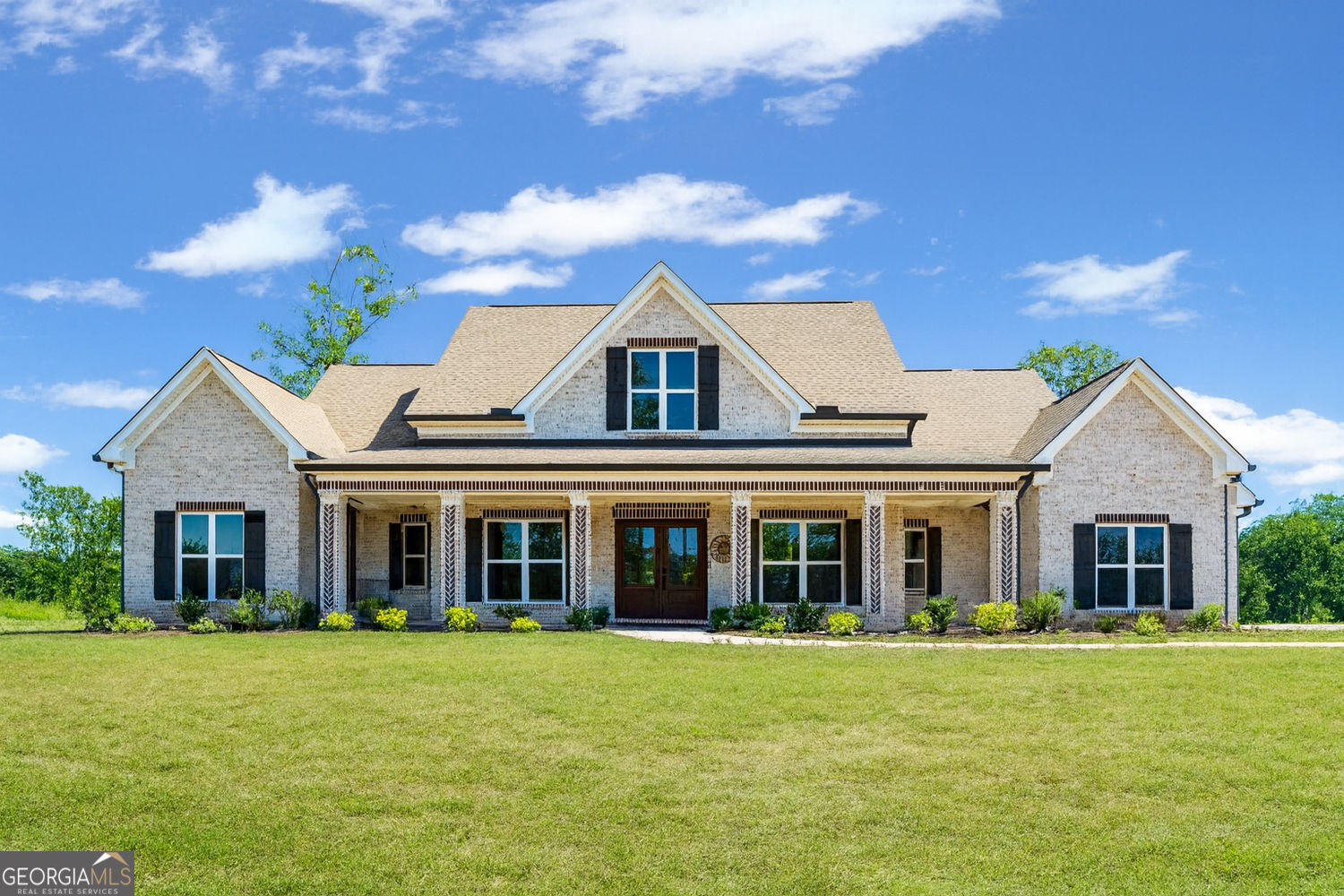 357 Old Driver Road Whitesburg, GA 30185 - Photo 6 of 75 front view of a house with a garden