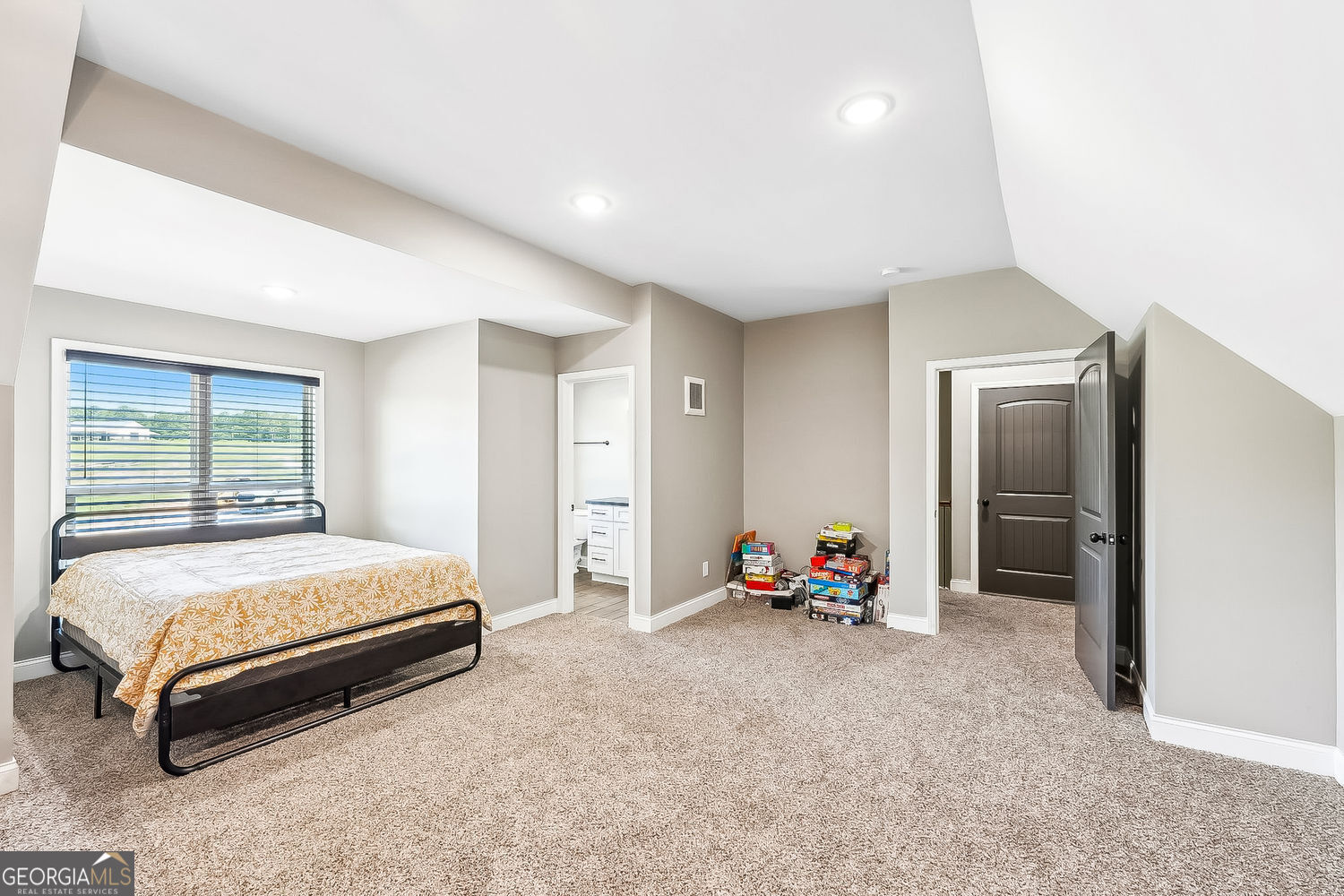 357 Old Driver Road Whitesburg, GA 30185 - Photo 61 of 75 a bedroom with bed and a large window