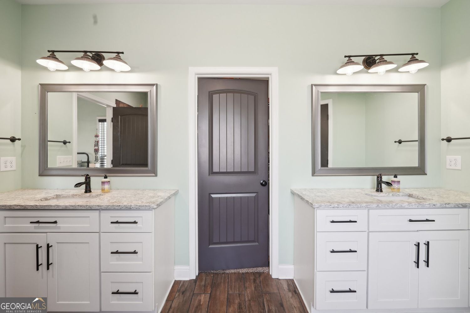 357 Old Driver Road Whitesburg, GA 30185 - Photo 67 of 75 a bathroom with a sink and a mirror