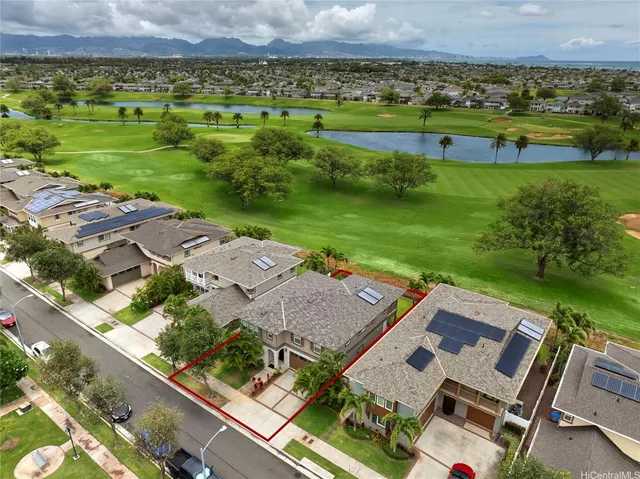 an aerial view of a house with a garden