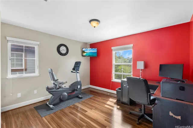 a workspace with furniture and a window