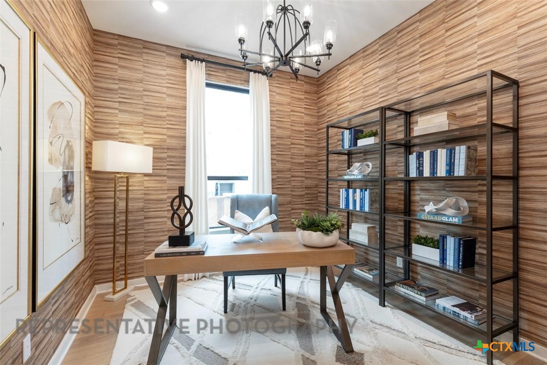 244 Basket Flower Loop Kyle, TX 78640 - Photo 15 of 34 a view of a livingroom with furniture and a window