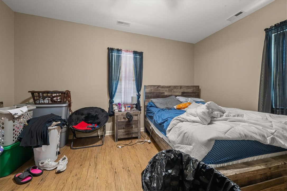 1102 West End Avenue Anderson, SC 29625 - Photo 14 of 28 This spacious room provides a warm and inviting atmosphere.