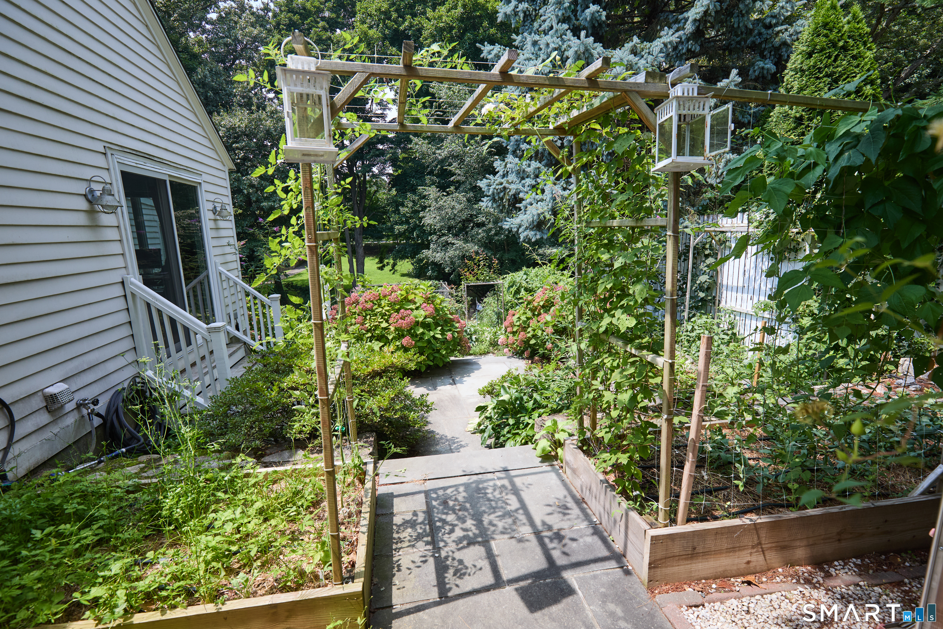 188 Compo Road South Westport, CT 06880 - Photo 2 of 39 a view of a garden with pathway