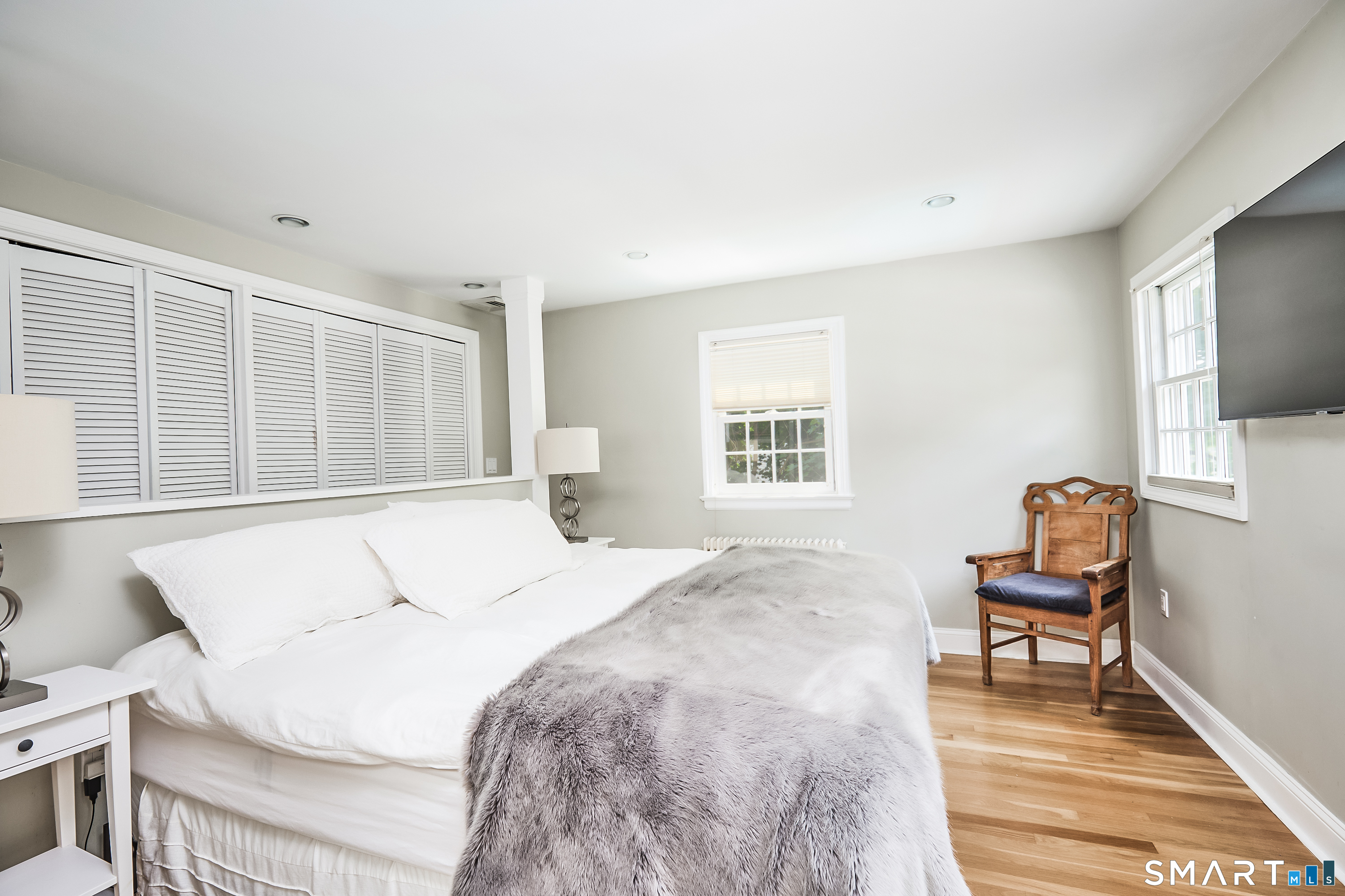 188 Compo Road South Westport, CT 06880 - Photo 22 of 39 a bedroom with a bed and a window