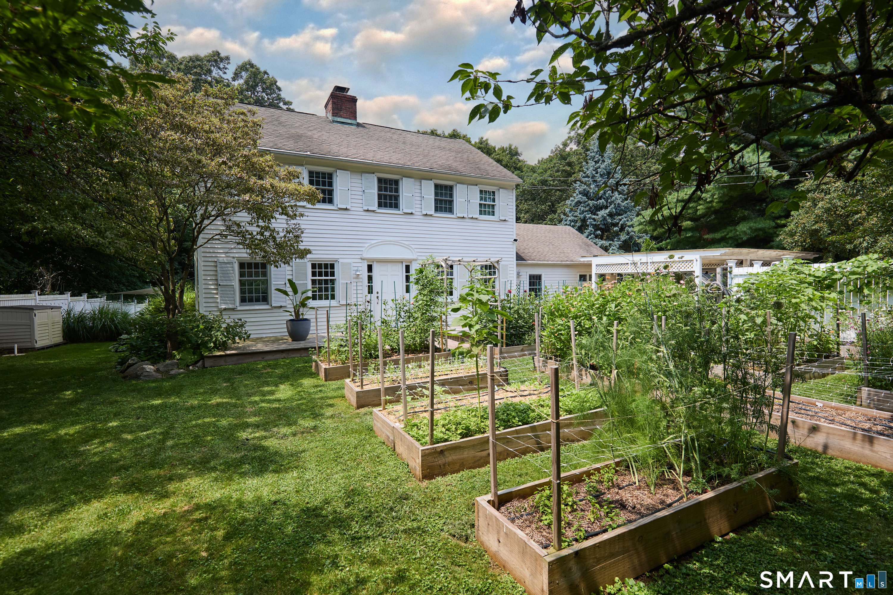 188 Compo Road South Westport, CT 06880 - Photo 3 of 39 a view of a house with backyard and garden