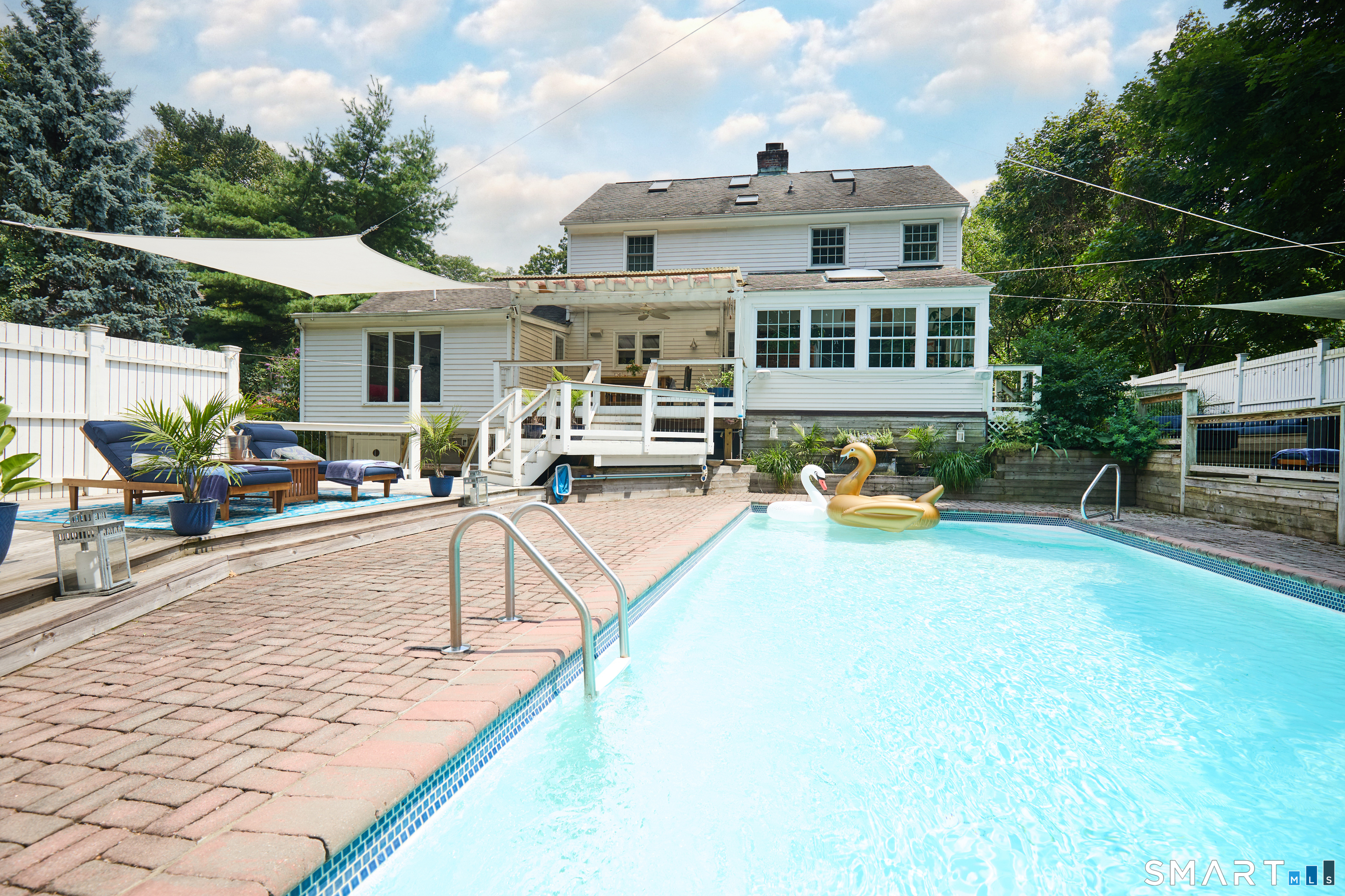 188 Compo Road South Westport, CT 06880 - Photo 34 of 39 a view of a house with swimming pool and sitting area