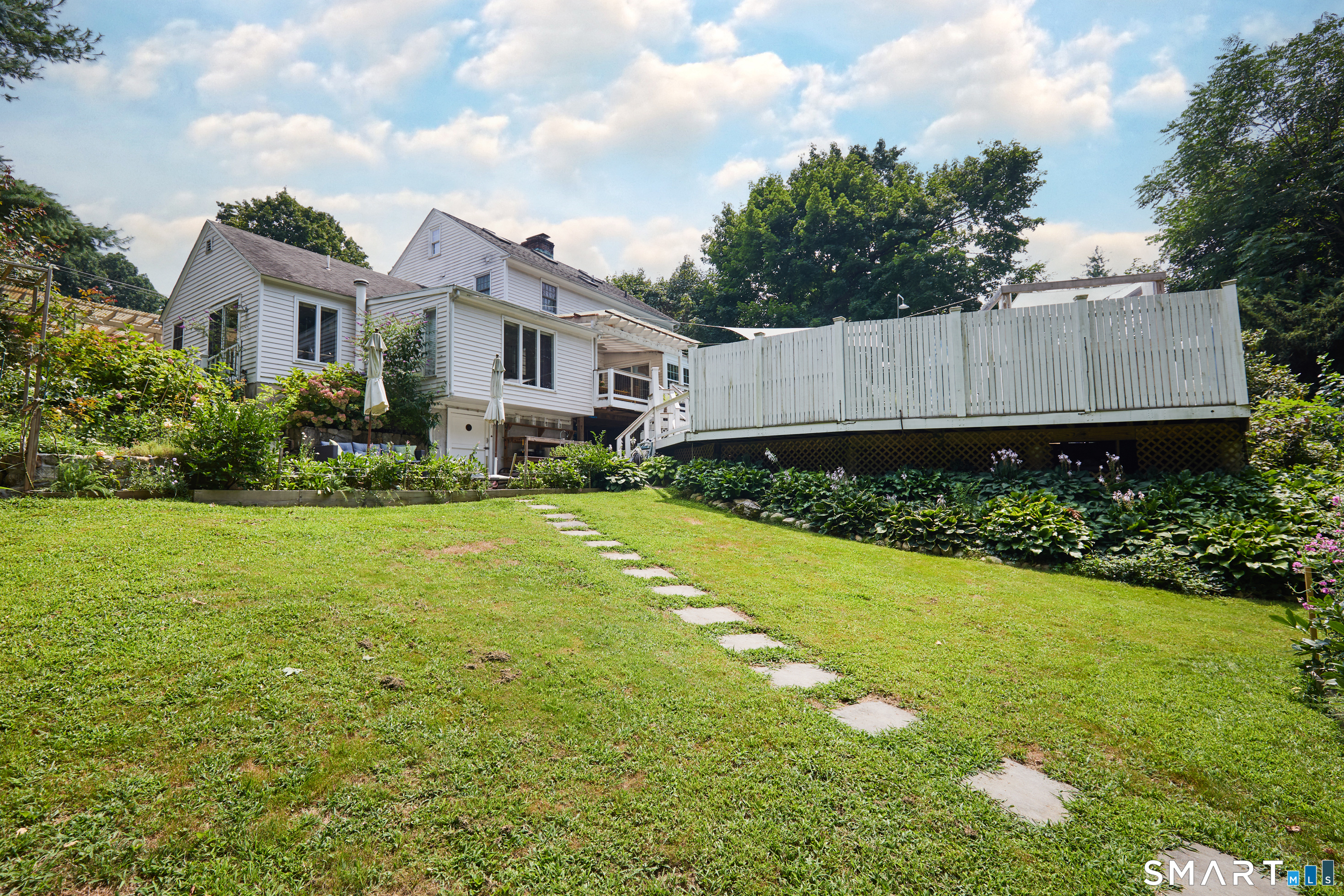 188 Compo Road South Westport, CT 06880 - Photo 38 of 39 a front view of a house with garden
