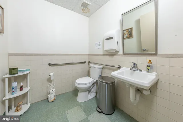 an aerial view of a house with a swimming pool
