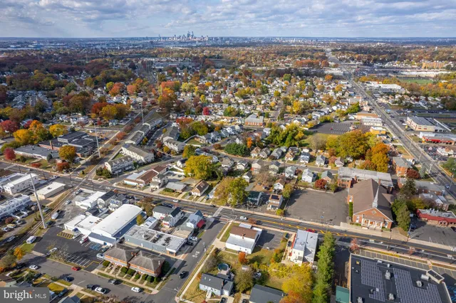 an aerial view of houses with outdoor space
