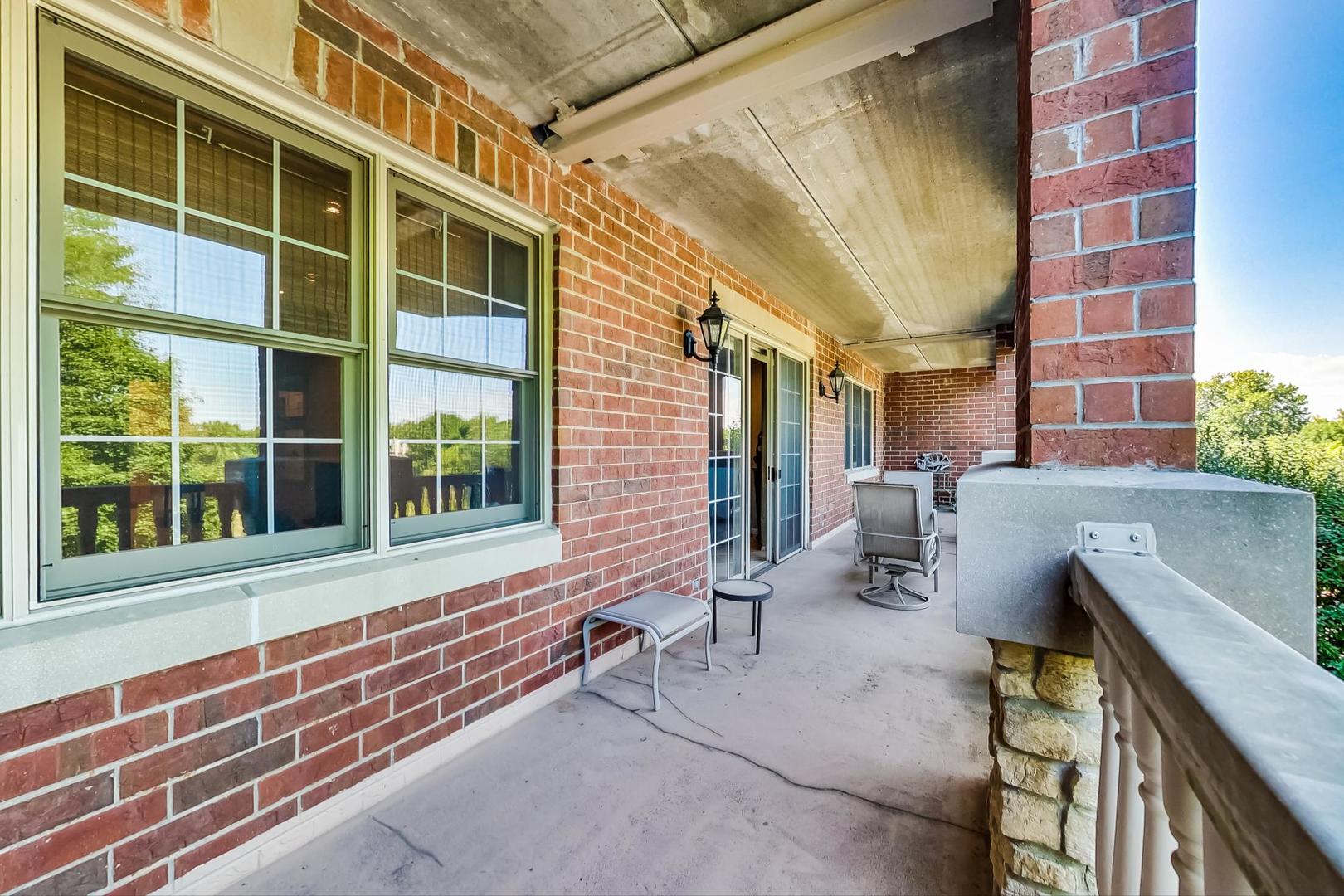 950 Augusta Way, Unit 204 Highland Park, IL 60035 - Photo 24 of 36 a house view with a outdoor space