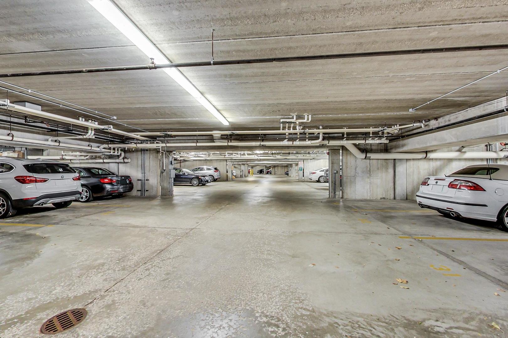 950 Augusta Way, Unit 204 Highland Park, IL 60035 - Photo 34 of 36 a view of parking garage with cars