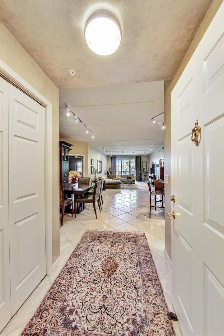 950 Augusta Way, Unit 204 Highland Park, IL 60035 - Photo 4 of 36 a living room with furniture and a wooden floor
