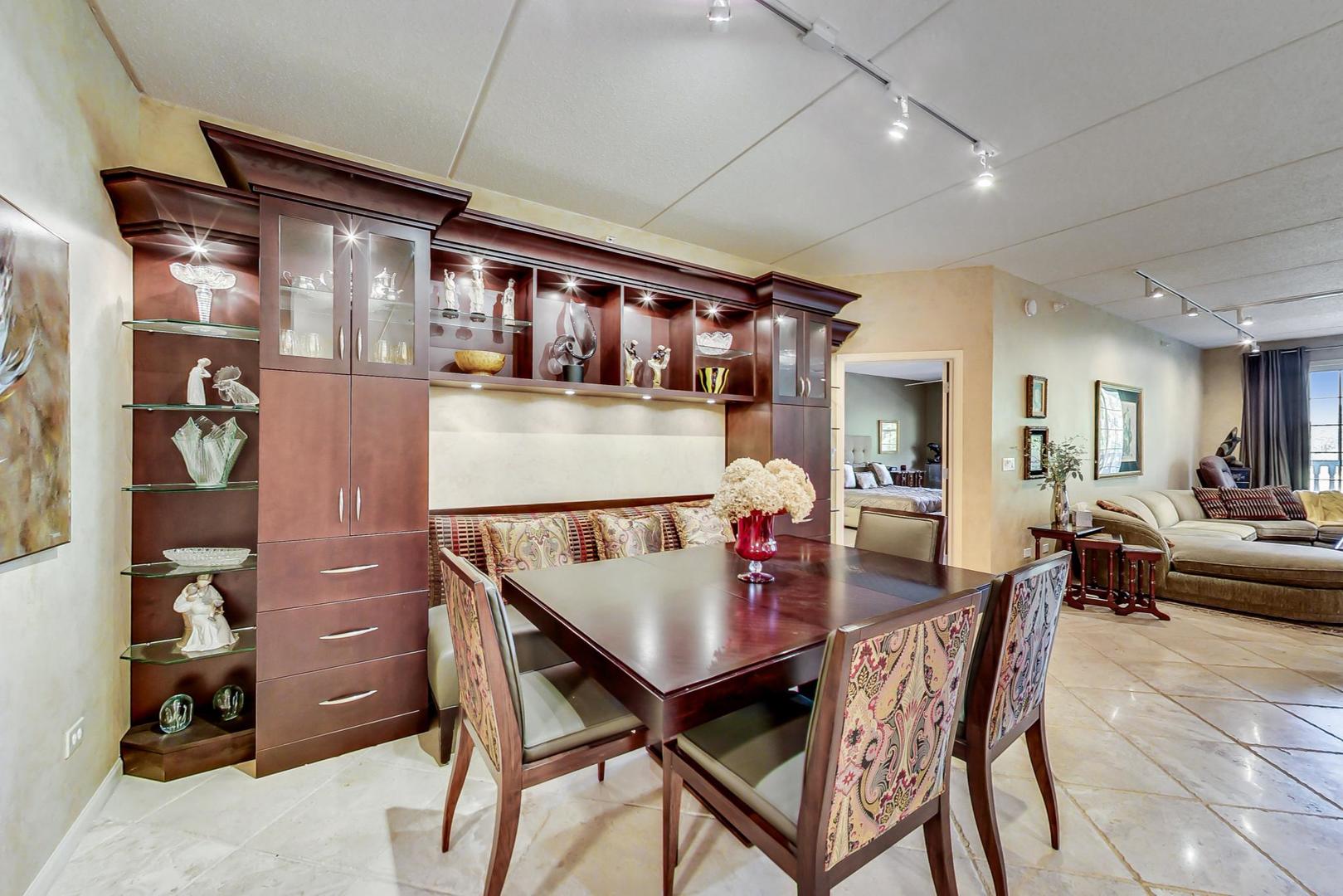 950 Augusta Way, Unit 204 Highland Park, IL 60035 - Photo 7 of 36 a view of a dining room with furniture