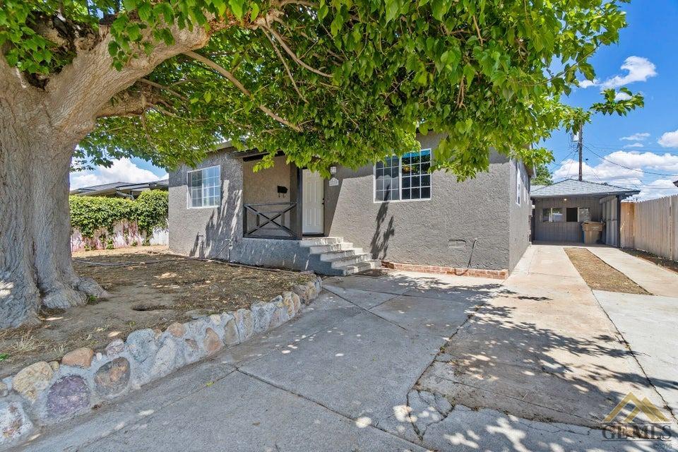 a house with trees in front of it