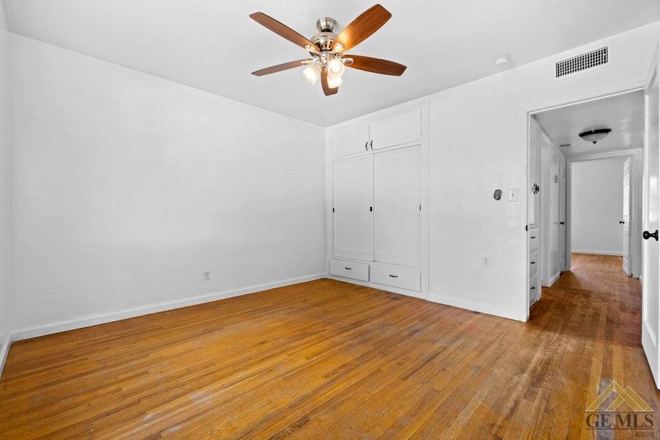 Undisclosed Address Bakersfield, CA 93308 - Photo 11 of 24 a view of a big room with wooden floor