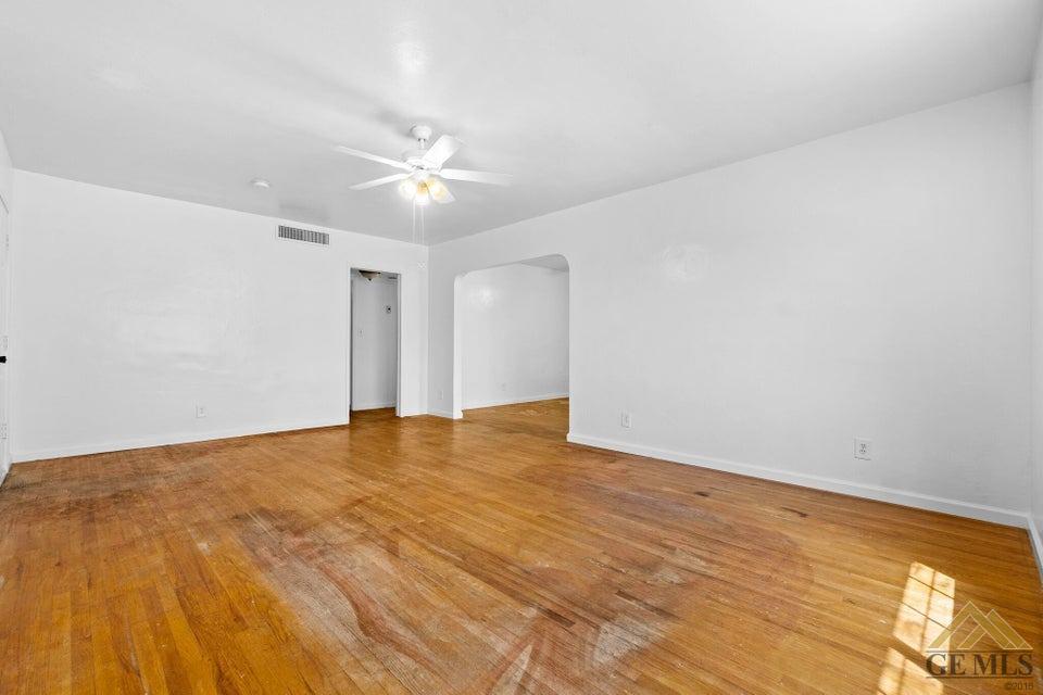 Undisclosed Address Bakersfield, CA 93308 - Photo 20 of 24 a view of an empty room and chandelier fan