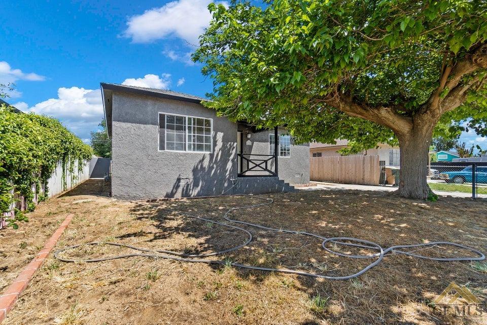 Undisclosed Address Bakersfield, CA 93308 - Photo 24 of 24 a view of a house with a yard