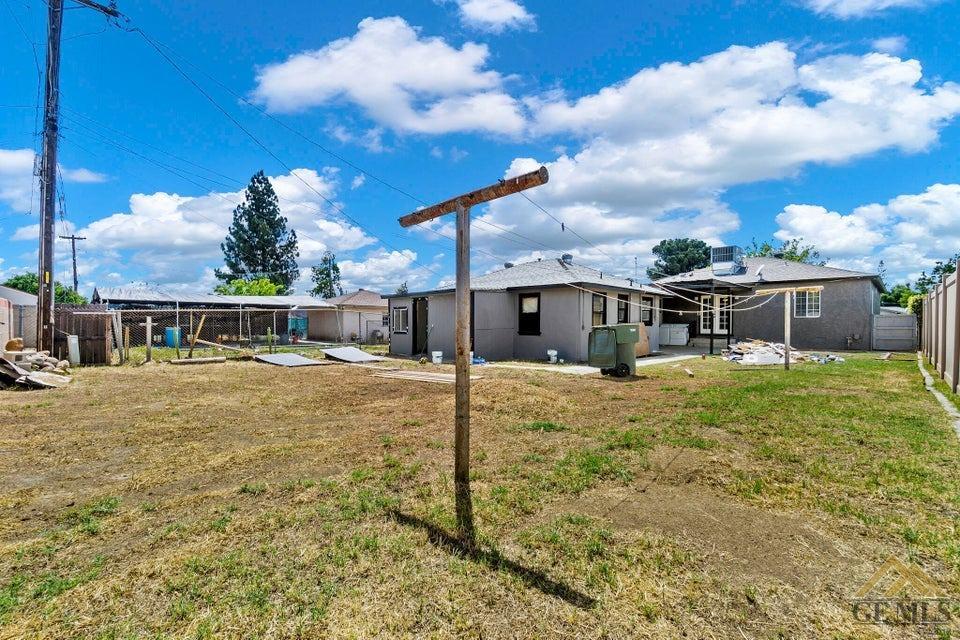 Undisclosed Address Bakersfield, CA 93308 - Photo 3 of 24 a front view of house with yard