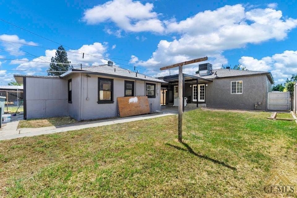 Undisclosed Address Bakersfield, CA 93308 - Photo 4 of 24 a view of a house with backyard and sitting area