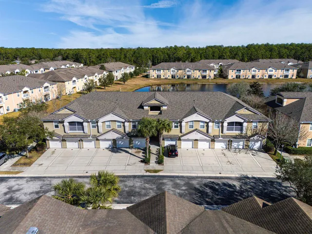 a view of a houses with a yard