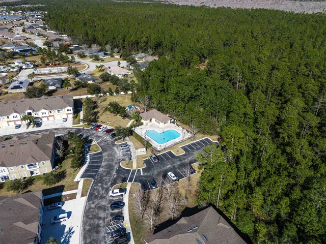 a view of a yard with plants