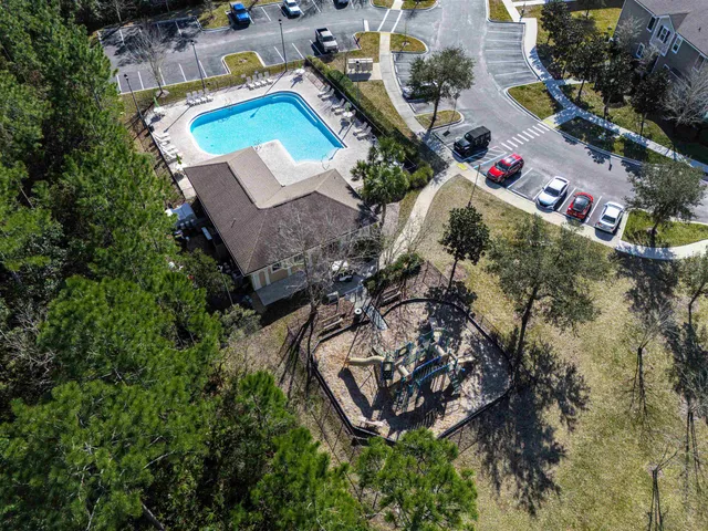 a view of swimming pool with lounge chair