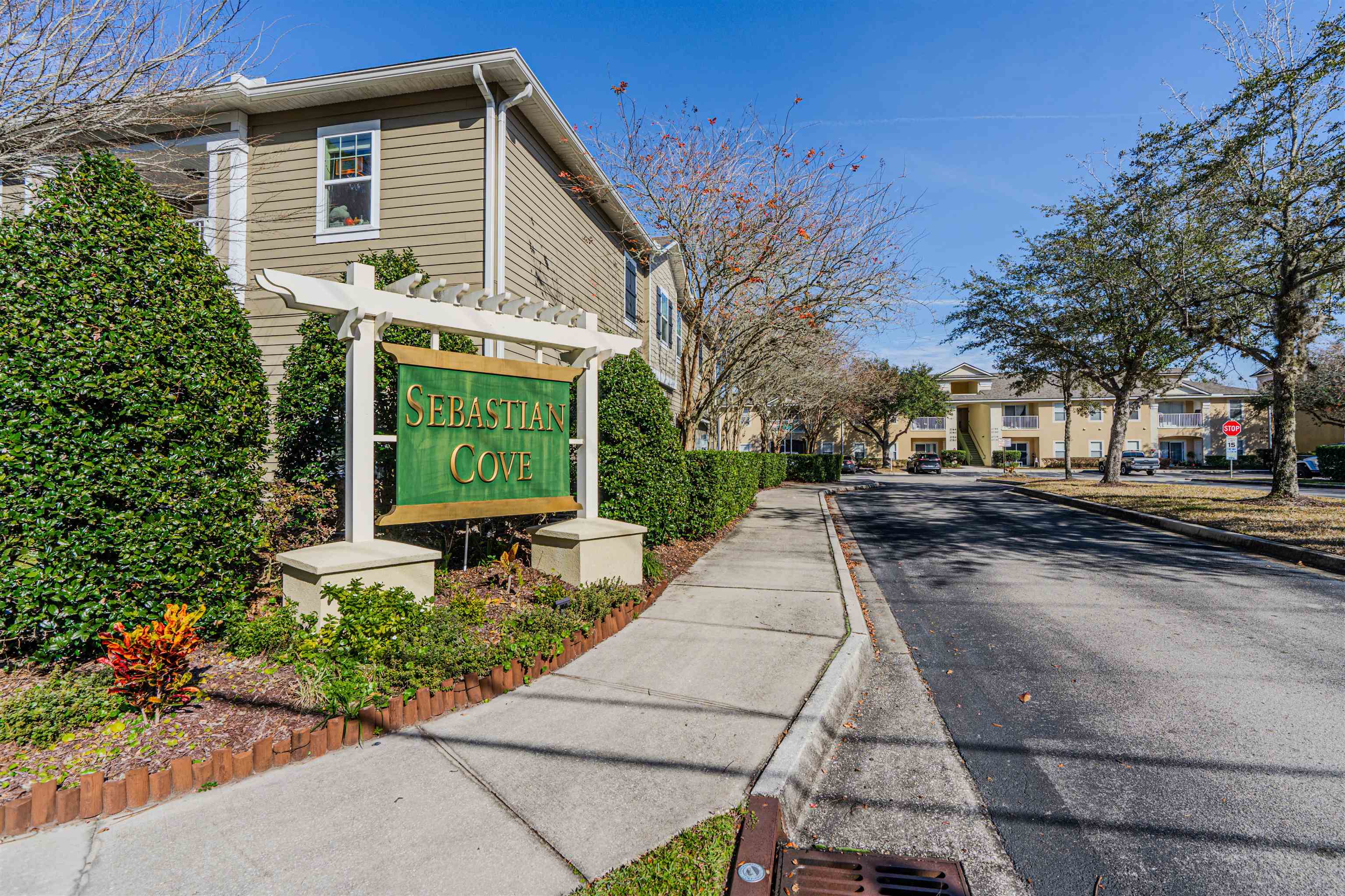 406 Golden Lake Loop St. Augustine, FL 32084 - Photo 49 of 51 a house with trees in front of it