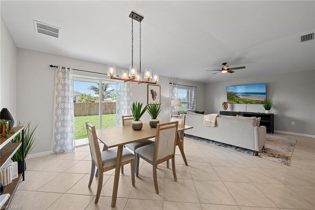 4139 Tulia Way North Fort Myers, FL 33917 - Photo 11 of 32 a view of a dining room and a furniture