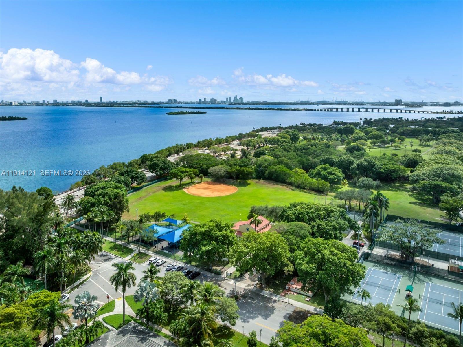 508 Northeast 67th Street Miami, FL 33138 - Photo 19 of 27 a view of a lake and a mountain