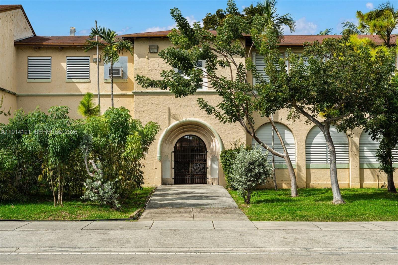 508 Northeast 67th Street Miami, FL 33138 - Photo 22 of 27 a view of a house with a garden