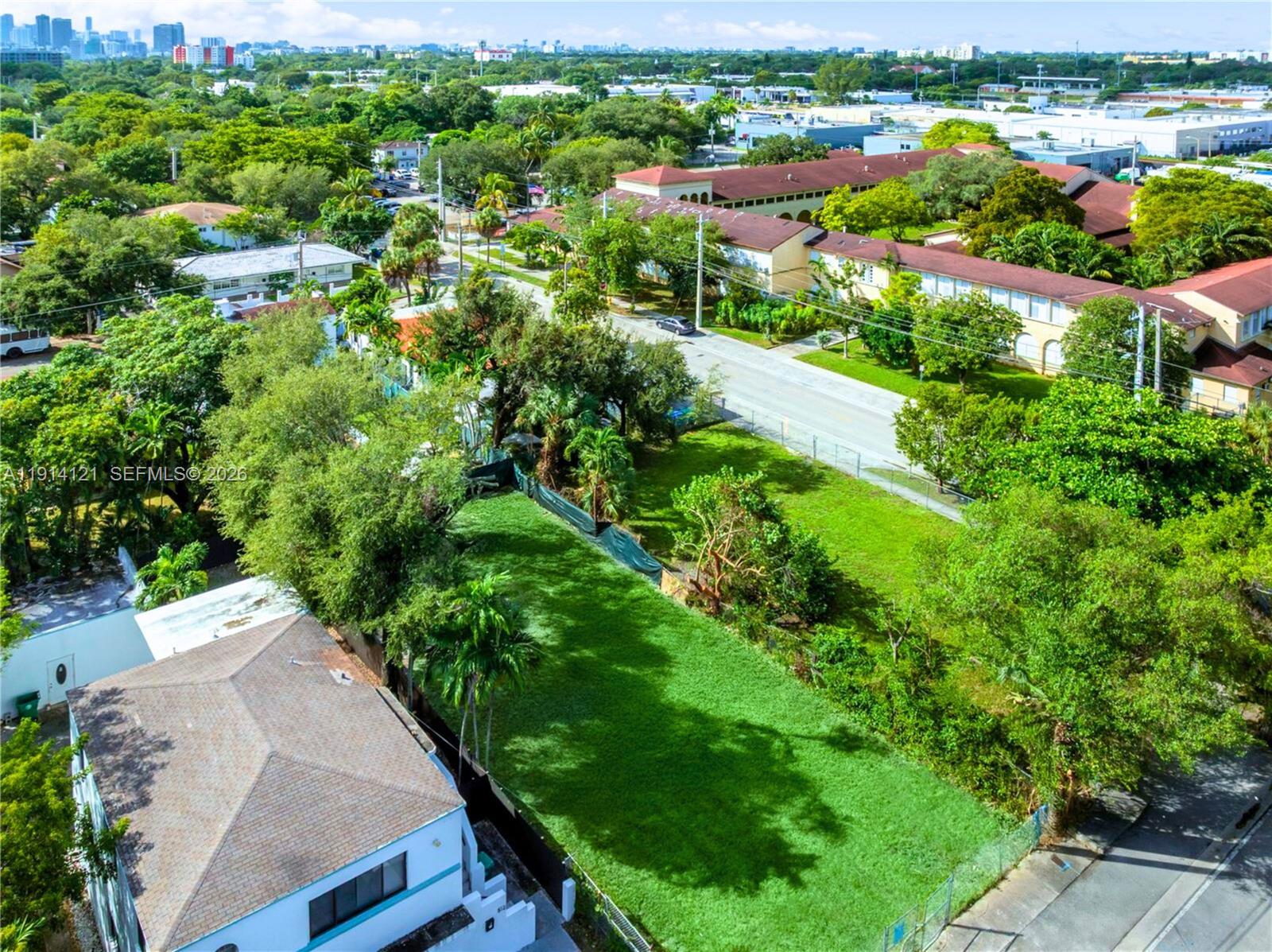 508 Northeast 67th Street Miami, FL 33138 - Photo 9 of 27 an aerial view of residential houses with outdoor space and street view