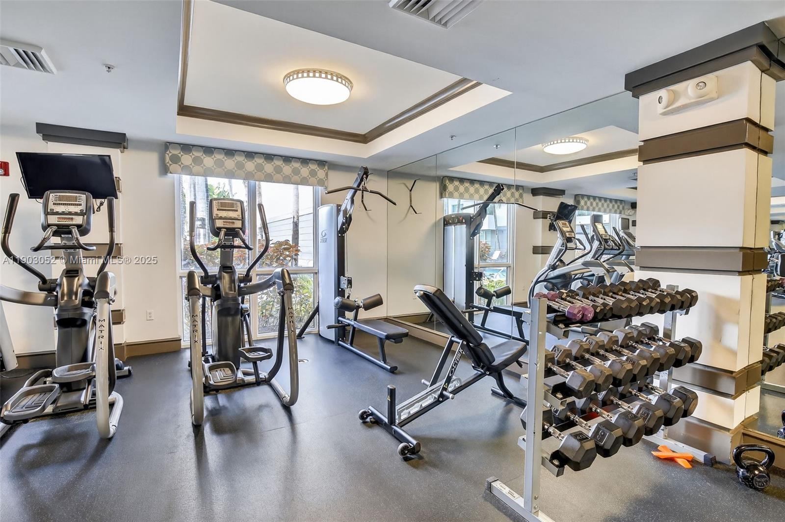 2421 Northeast 65th Street, Unit 508 Fort Lauderdale, FL 33308 - Photo 25 of 29 a view of a room with gym equipment