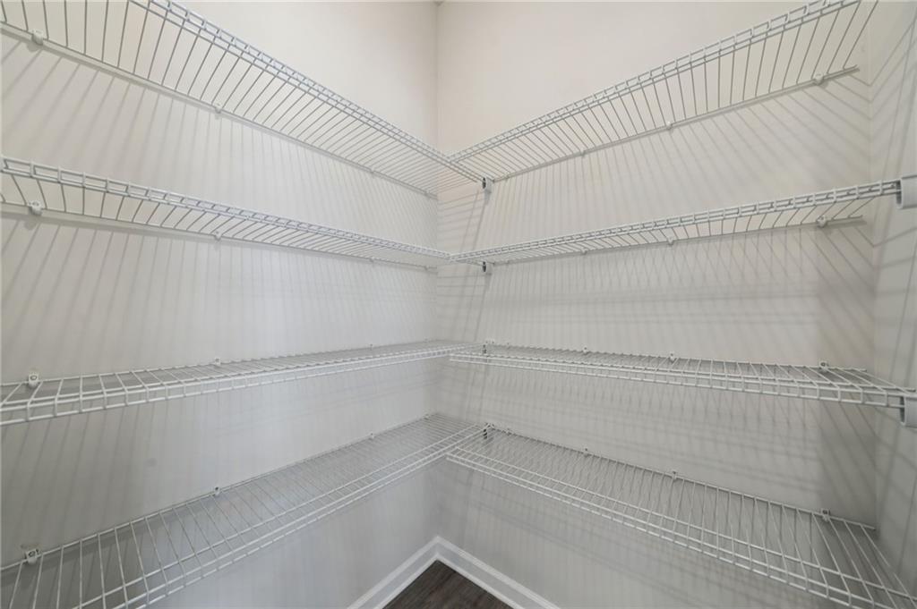 7830 Marie Way Fairburn, GA 30213 - Photo 13 of 30 a view of a room with shelf