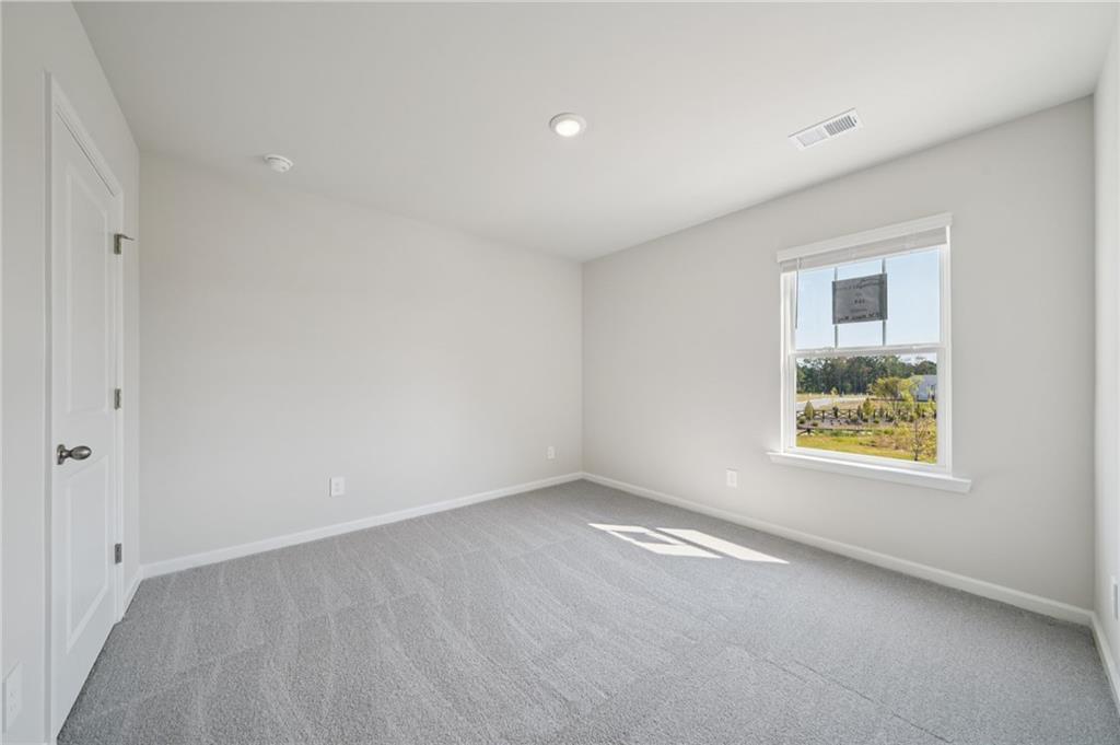 7830 Marie Way Fairburn, GA 30213 - Photo 24 of 30 an empty room with a window