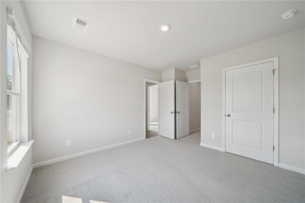 7830 Marie Way Fairburn, GA 30213 - Photo 25 of 30 a view of an empty room