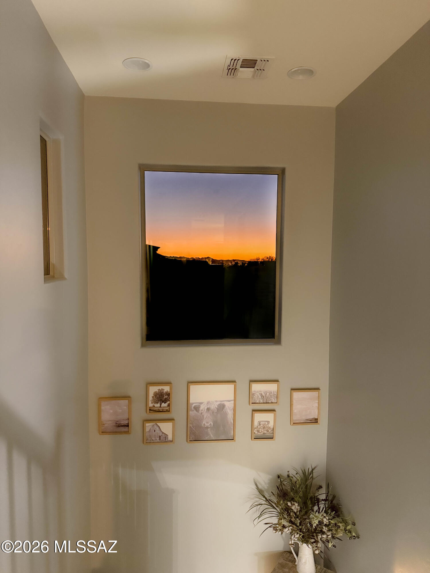 211 East Refuge Loop Vail, AZ 85641 - Photo 45 of 48 a living room with a flat screen tv and a wall painting